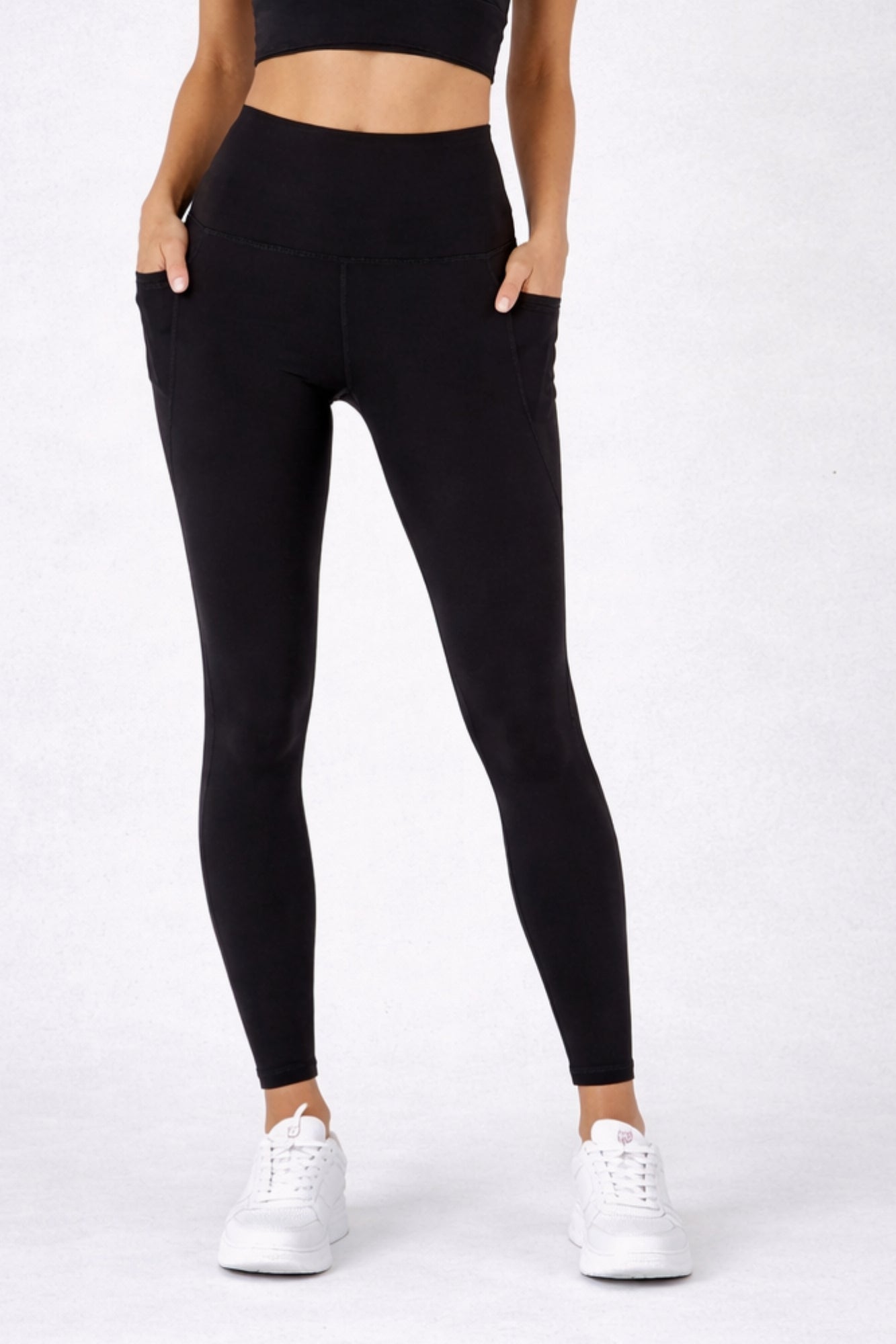 Legging sculptant taille haute pleine longueur avec poches