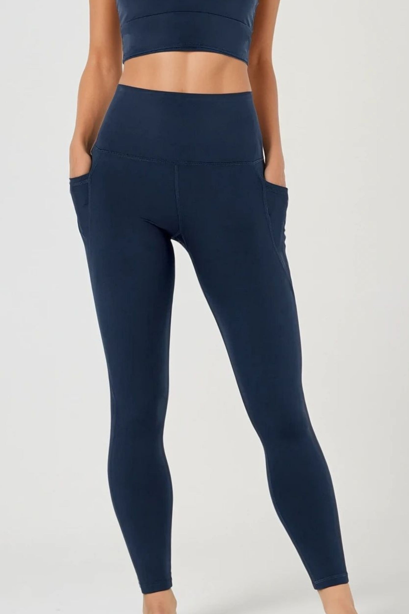 Legging gainant taille haute à poches pleine longueur